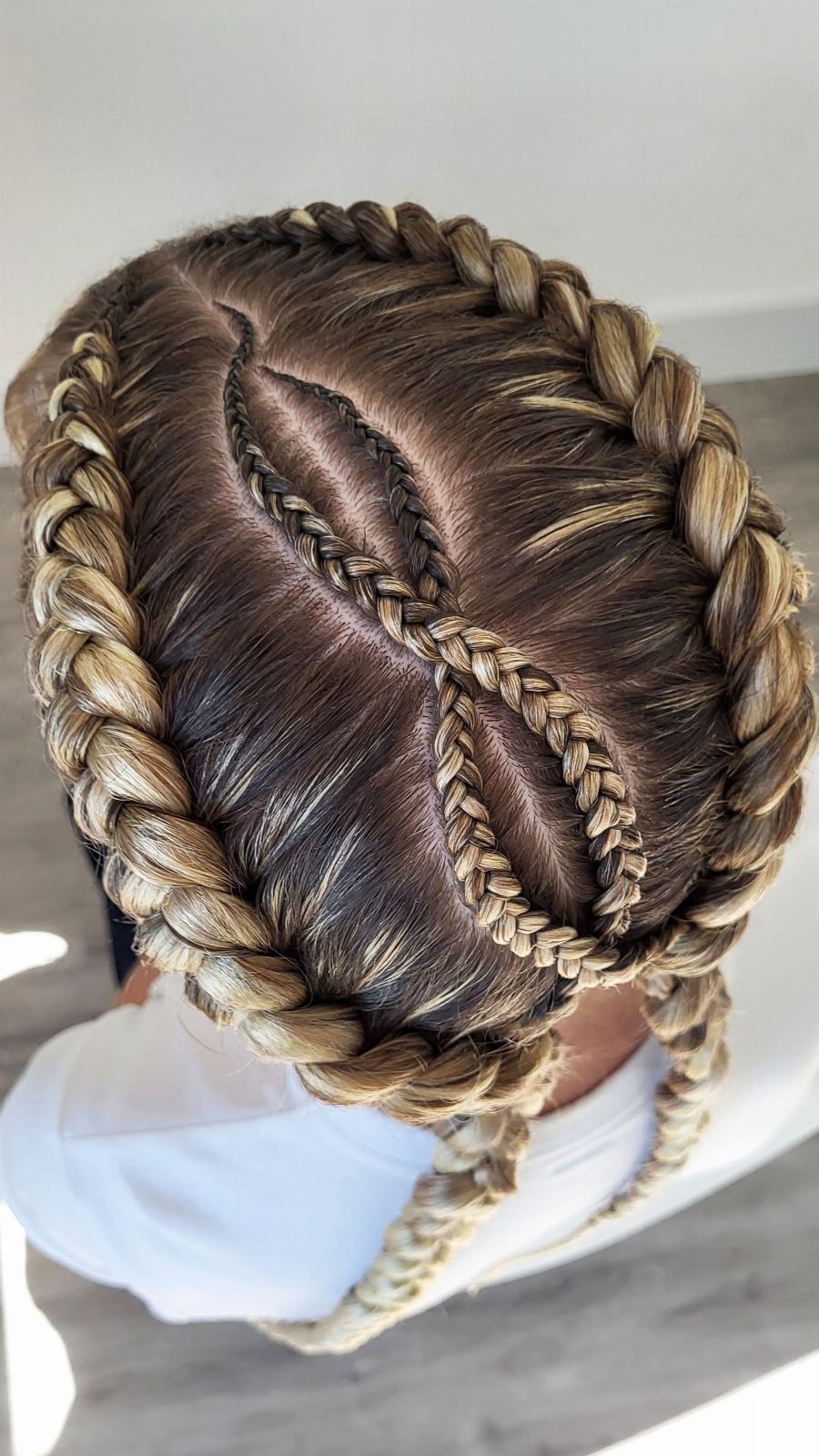 Dutch Braids and Cornrows with Braiding Hair — close-up