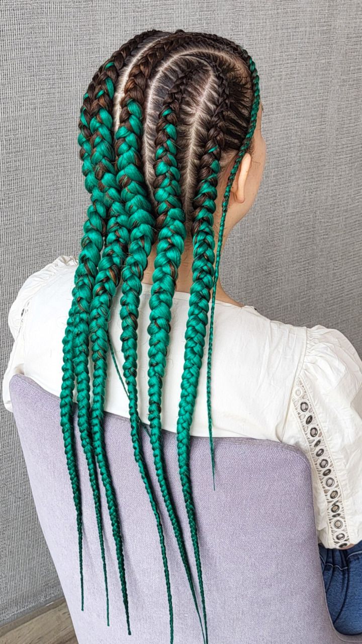 Feed-In Braids with Gradual Addition of Green Braiding Hair — in use
