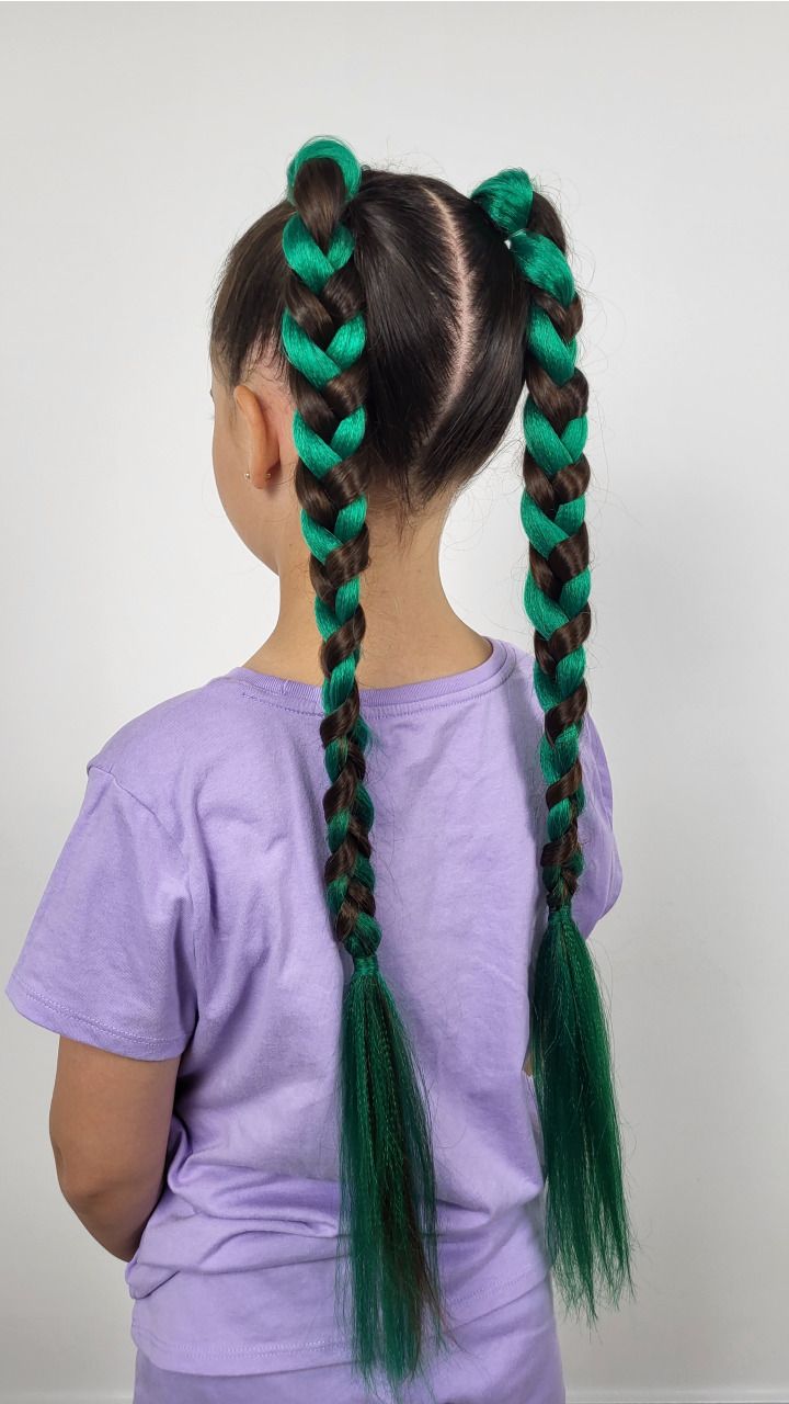 Two Braided Pigtails with Green Braiding Hair — close-up